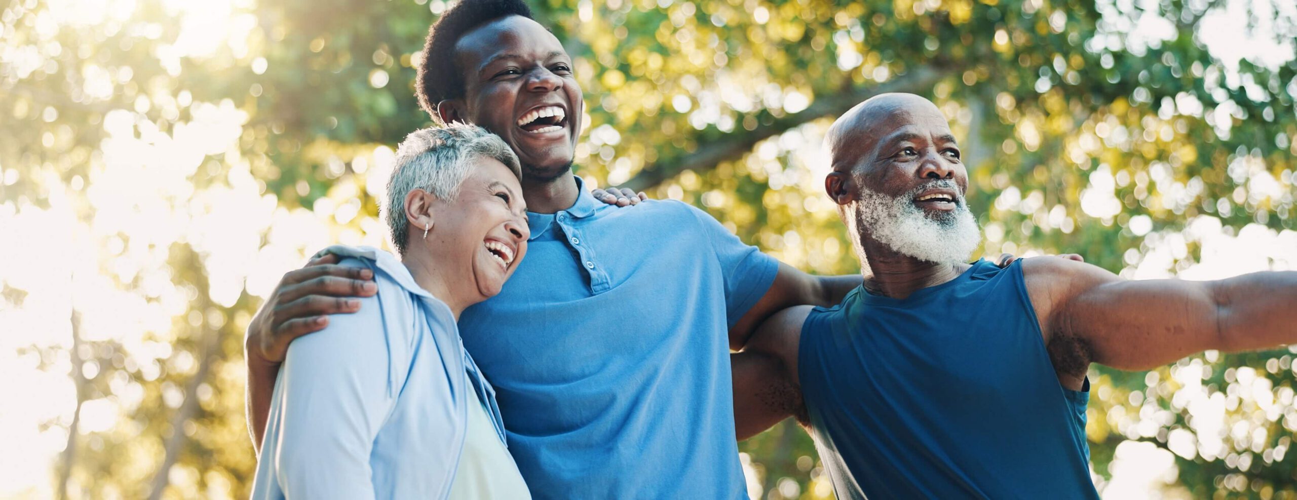 Senior, people and coach for fitness outdoor of mobility training, funny discussion and morning routine. Below, elderly community and laugh with conversation, exercise joke and cardio workout at park.